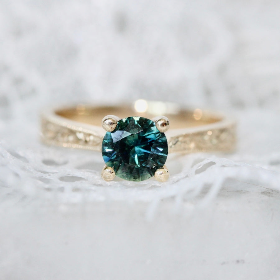 
            teal sapphire engagement ring