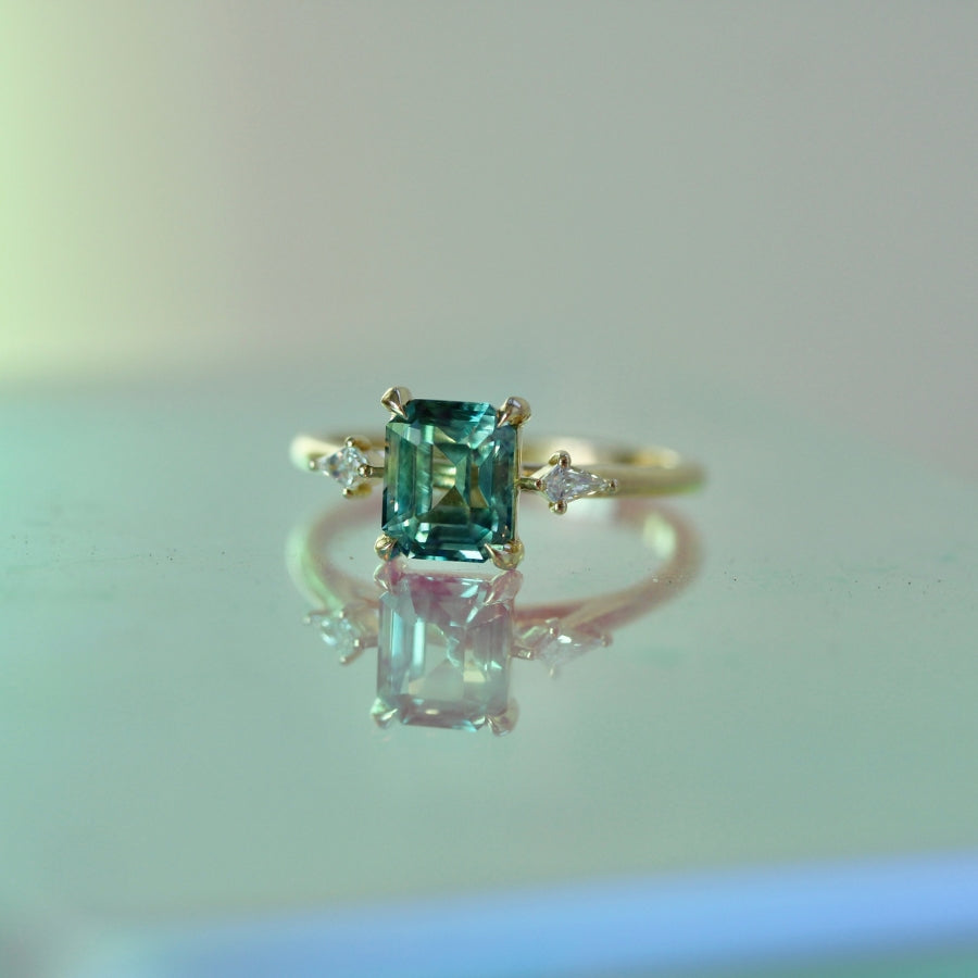 
            teal sapphire ring