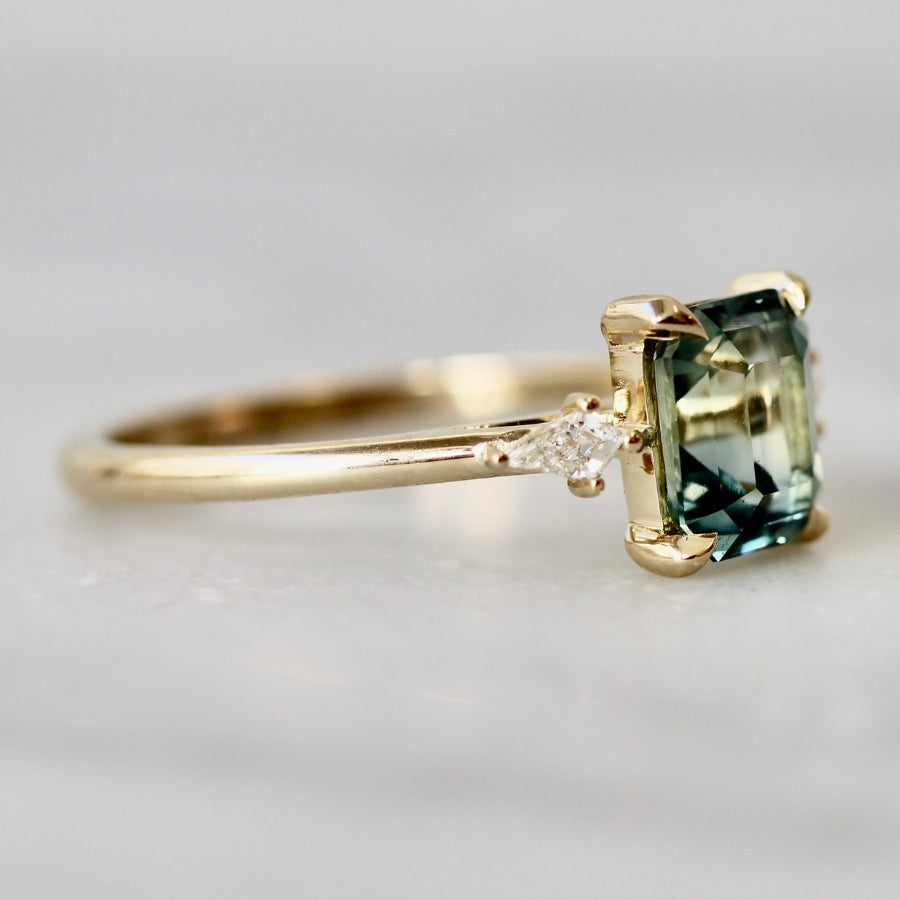 
            teal sapphire ring