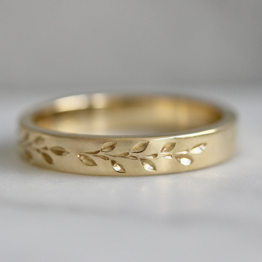 
            vine engraved gold band