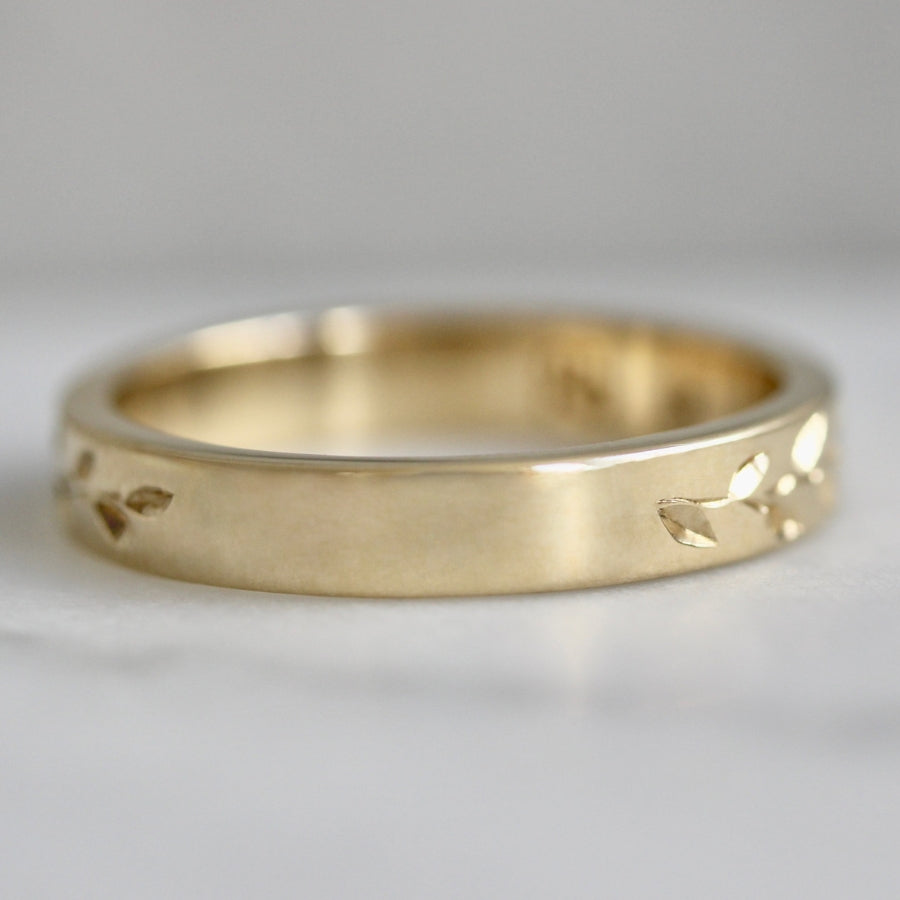 vine engraved gold band