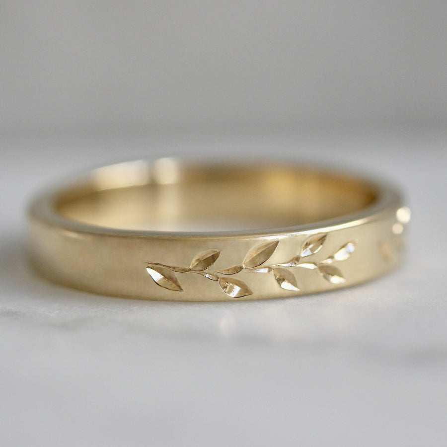 
            vine engraved gold band