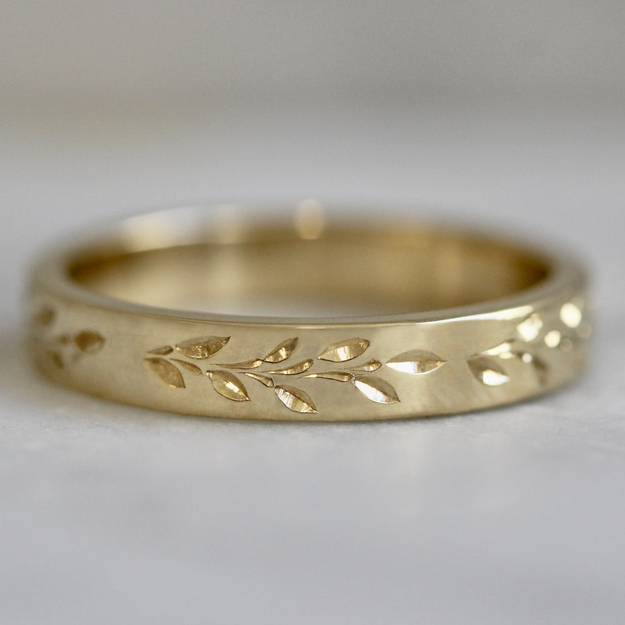 
            vine engraved gold band