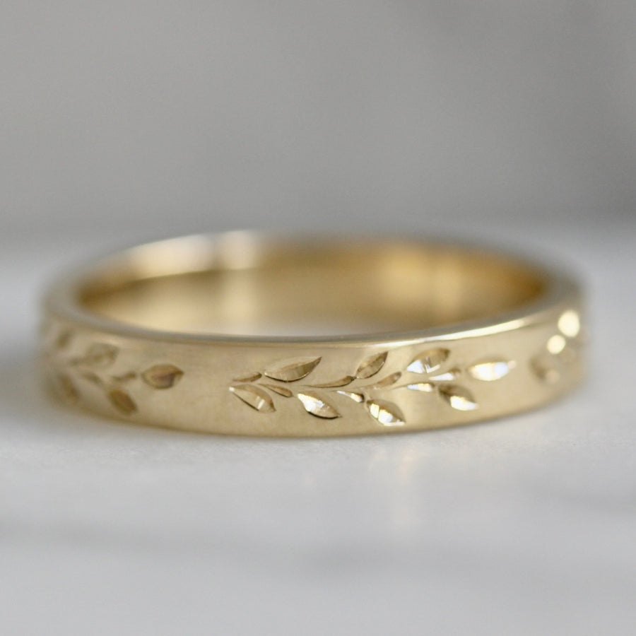 
            vine engraved gold band