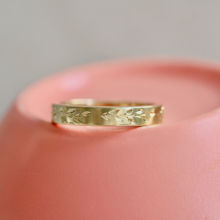 
            vine engraved gold band