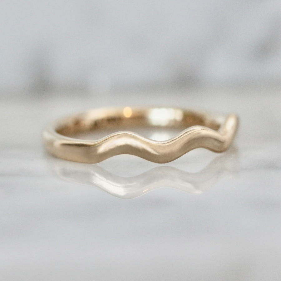 
            wavy gold band