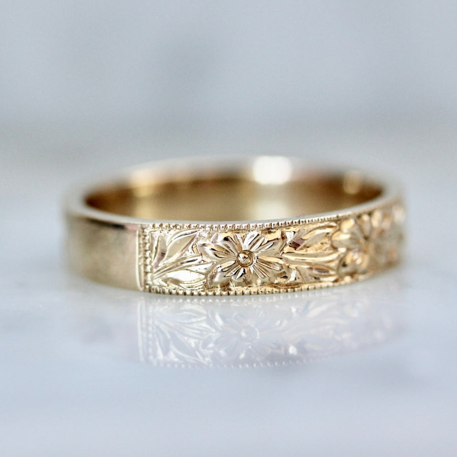 
            wild flower engraved wedding band