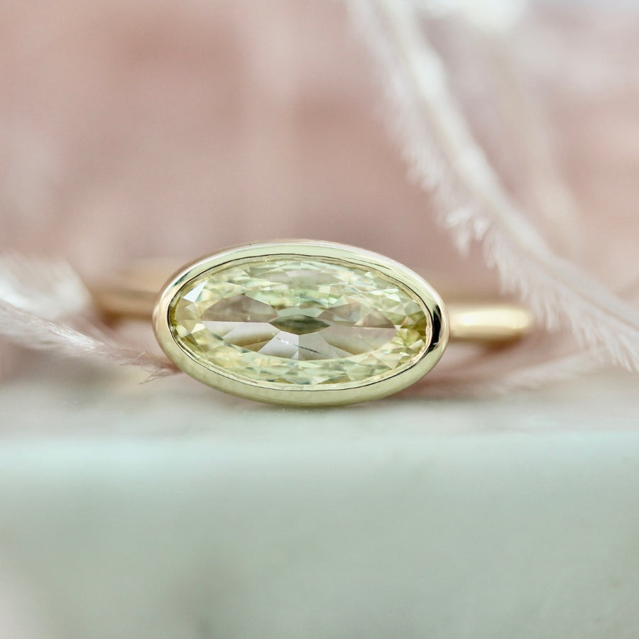 yellow moval diamond engagement ring