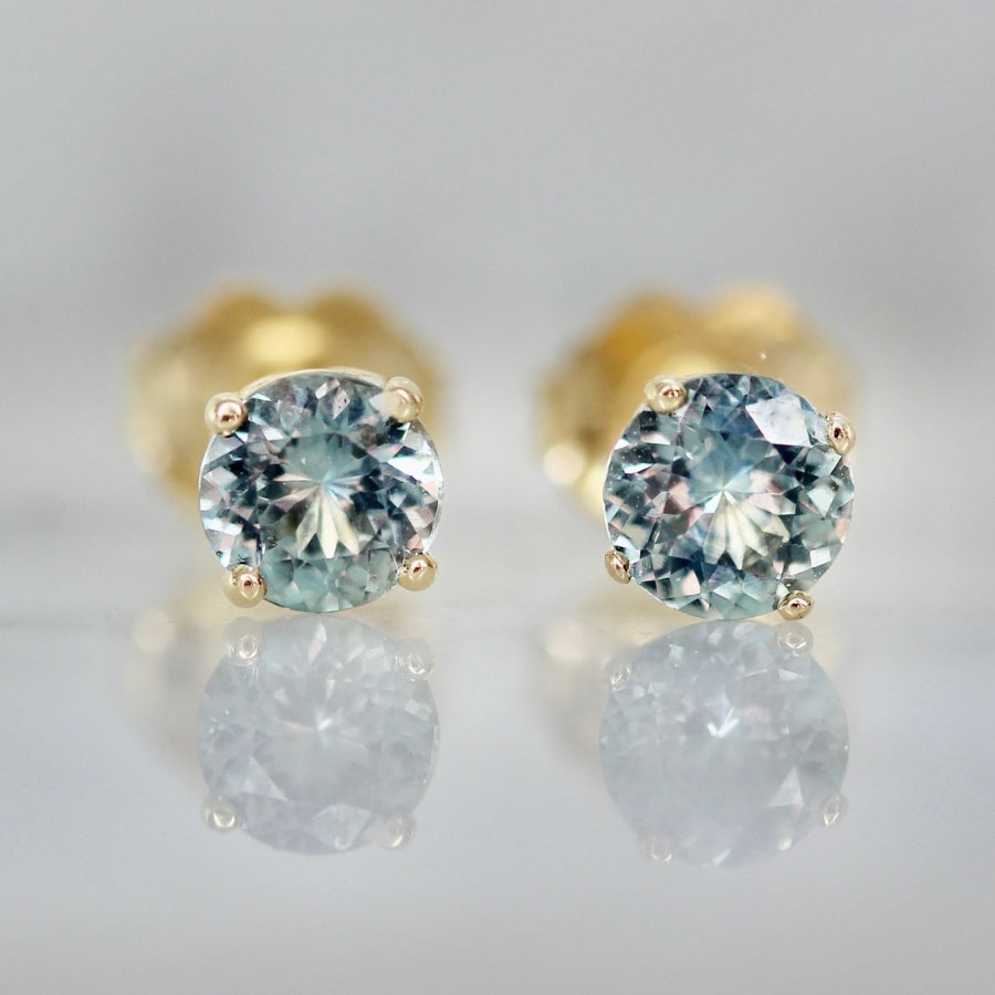 
            .90 Carats Total Round Cut Light Teal Montana Sapphire Earrings