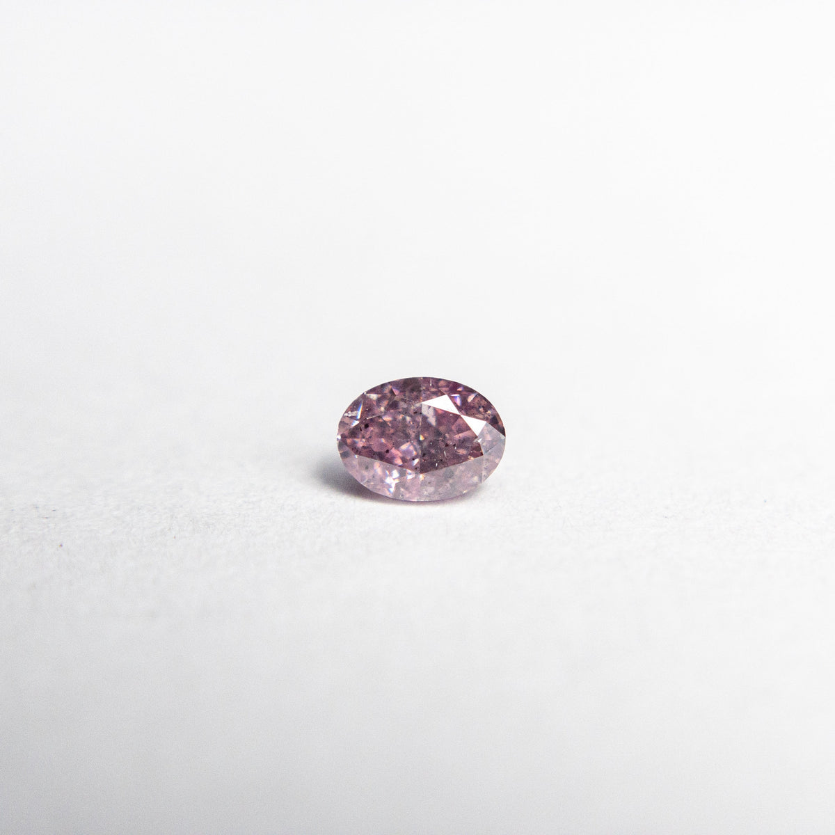
            0.16ct 3.67x2.71x1.90mm Argyle Fancy Intense Purple Pink Oval Brilliant 18680-03 - Misfit Diamonds
