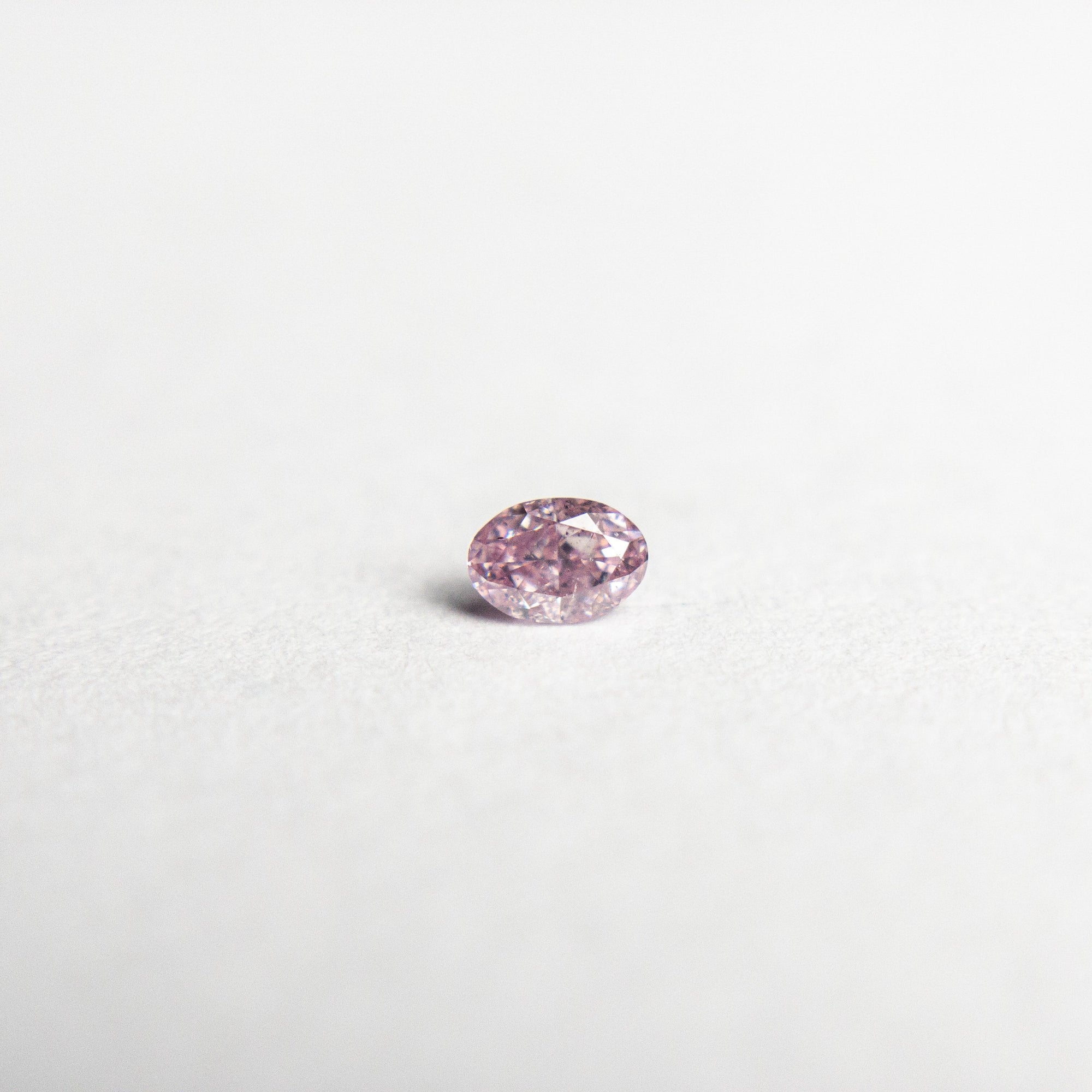 0.07ct 3.05x2.12x1.42mm Argyle Fancy Intense Purple Pink Oval Brilliant 18680-10 - Misfit Diamonds