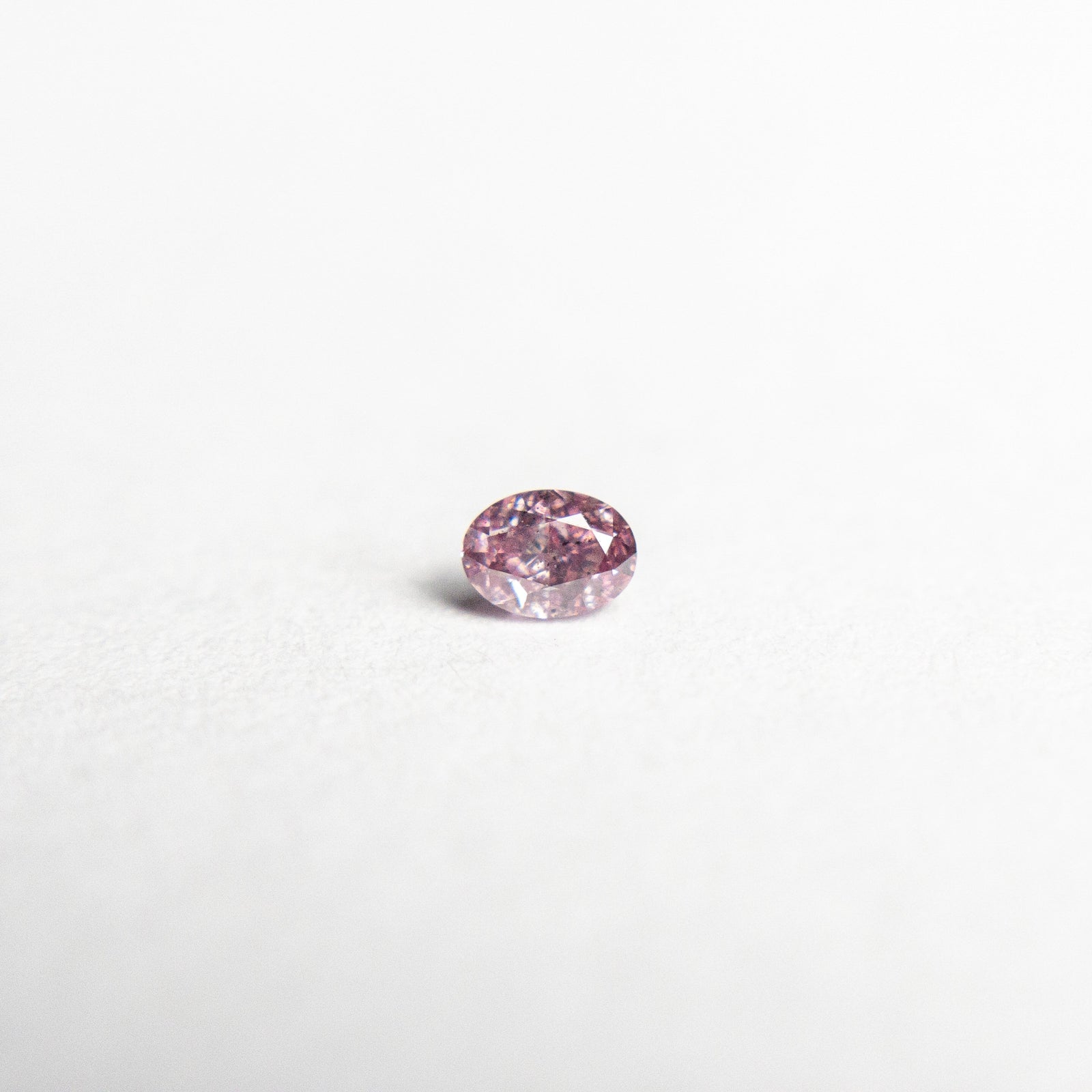 0.07ct 2.83x2.07x1.48mm Argyle Fancy Intense Purple Pink Oval Brilliant 18680-11 - Misfit Diamonds