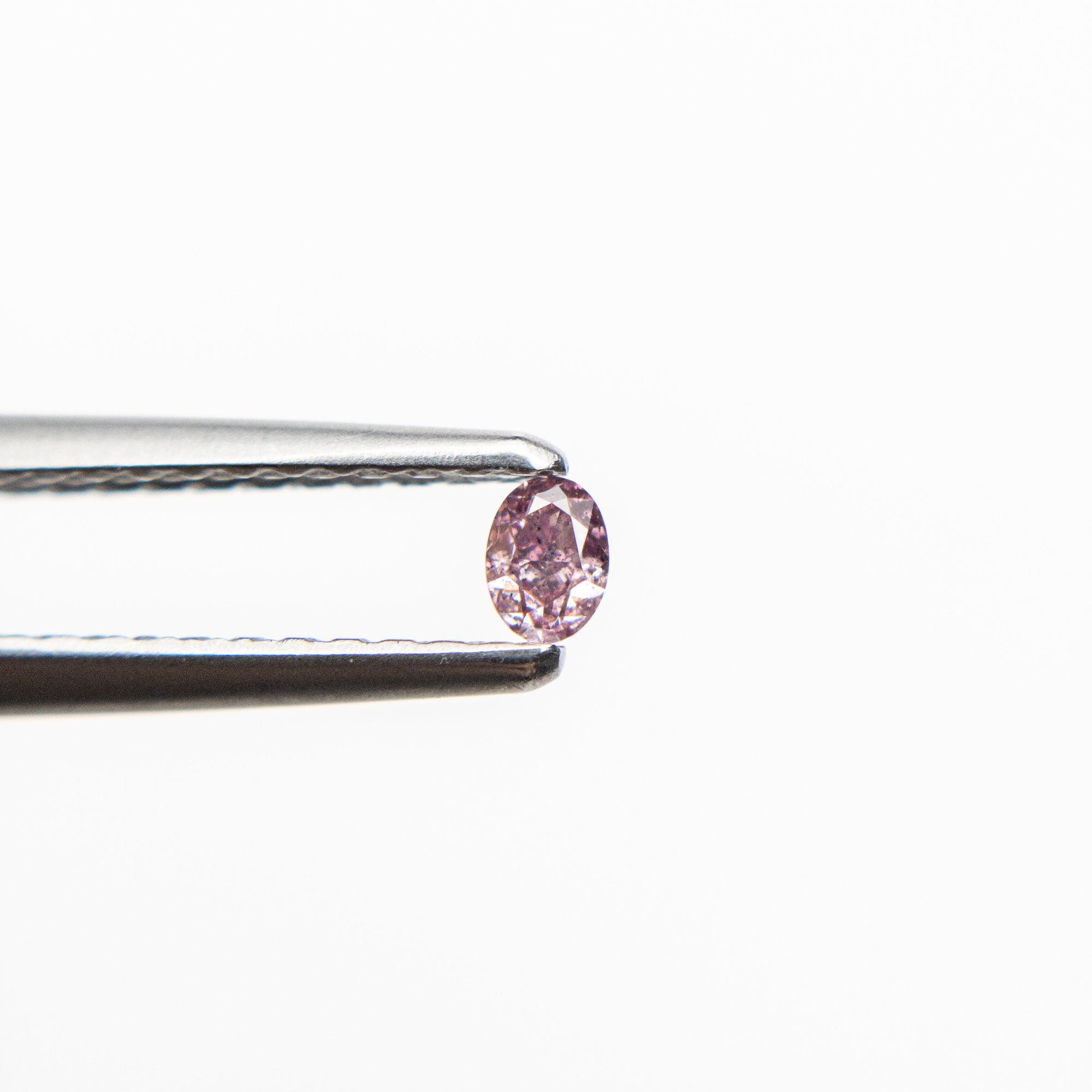 0.07ct 2.83x2.07x1.48mm Argyle Fancy Intense Purple Pink Oval Brilliant 18680-11 - Misfit Diamonds