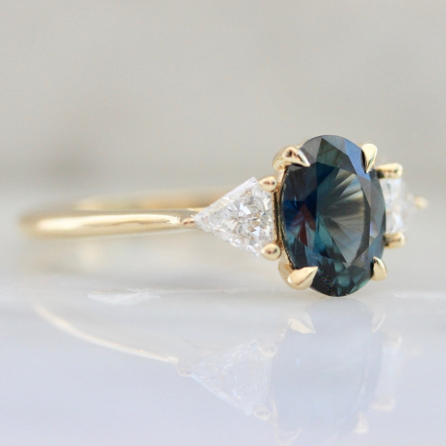 
            Lovebird Blue-Green Oval Cut Sapphire Ring