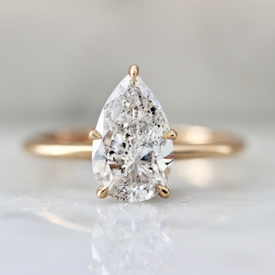 Diamond dust clearance engagement rings