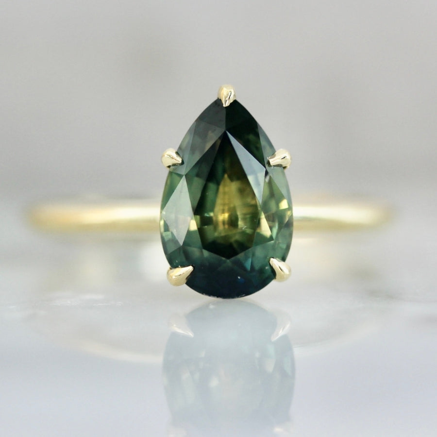 
            2.11 Carat Stella Green Pear Cut Parti Sapphire Ring