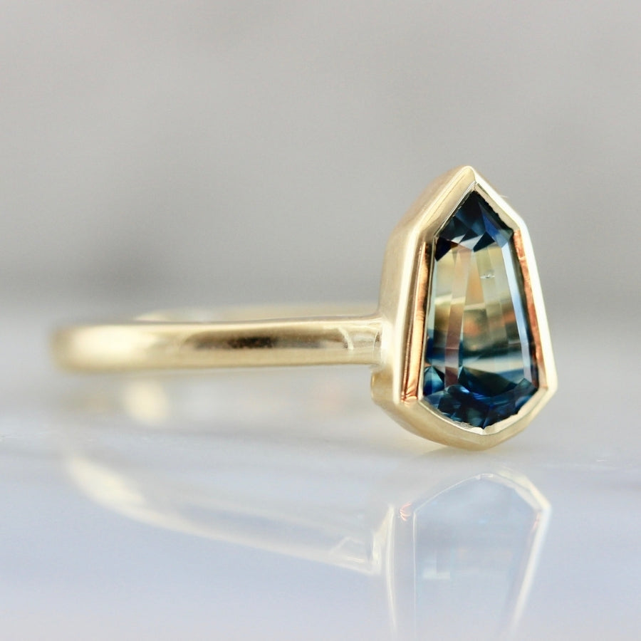 
            Tempest Bi-Color Blue-Yellow Shield Cut Sapphire Ring