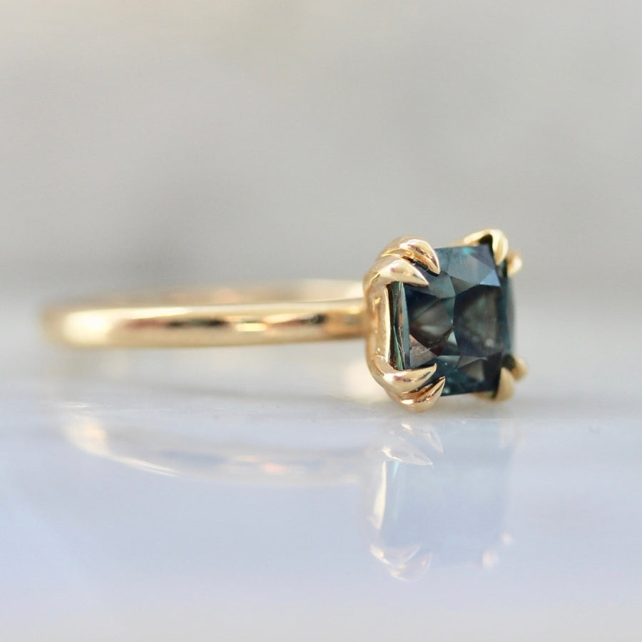
            Coquette Teal Radiant Cut Sapphire Ring