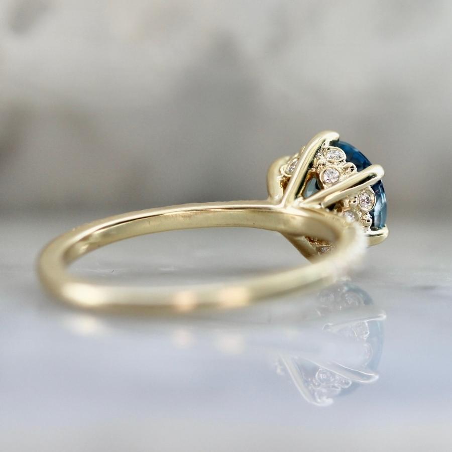 Iria Blue Round Brilliant Cut Sapphire Ring