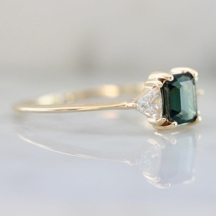 
            Icaria Blue-Green Emerald Cut Sapphire Ring