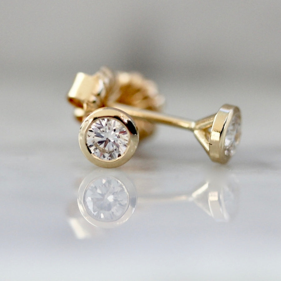 .21 Carats Total White Round Brilliant Cut Diamond Studs