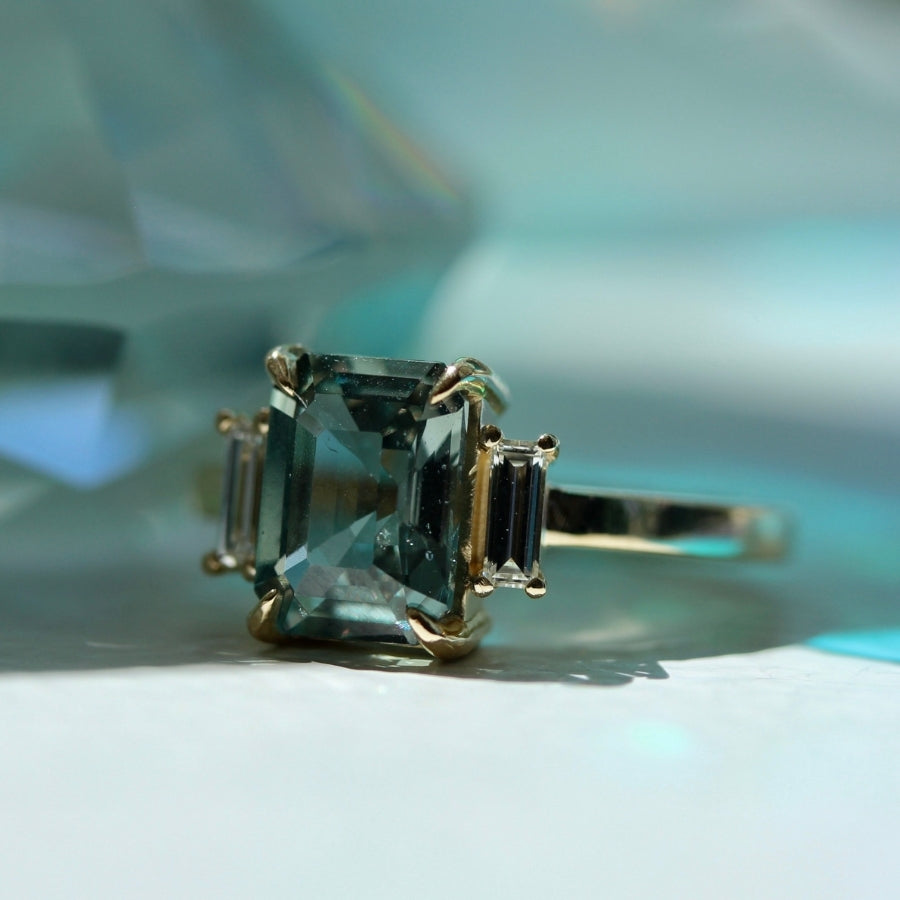 High Noon Green Color Change Emerald Cut Sapphire Ring
