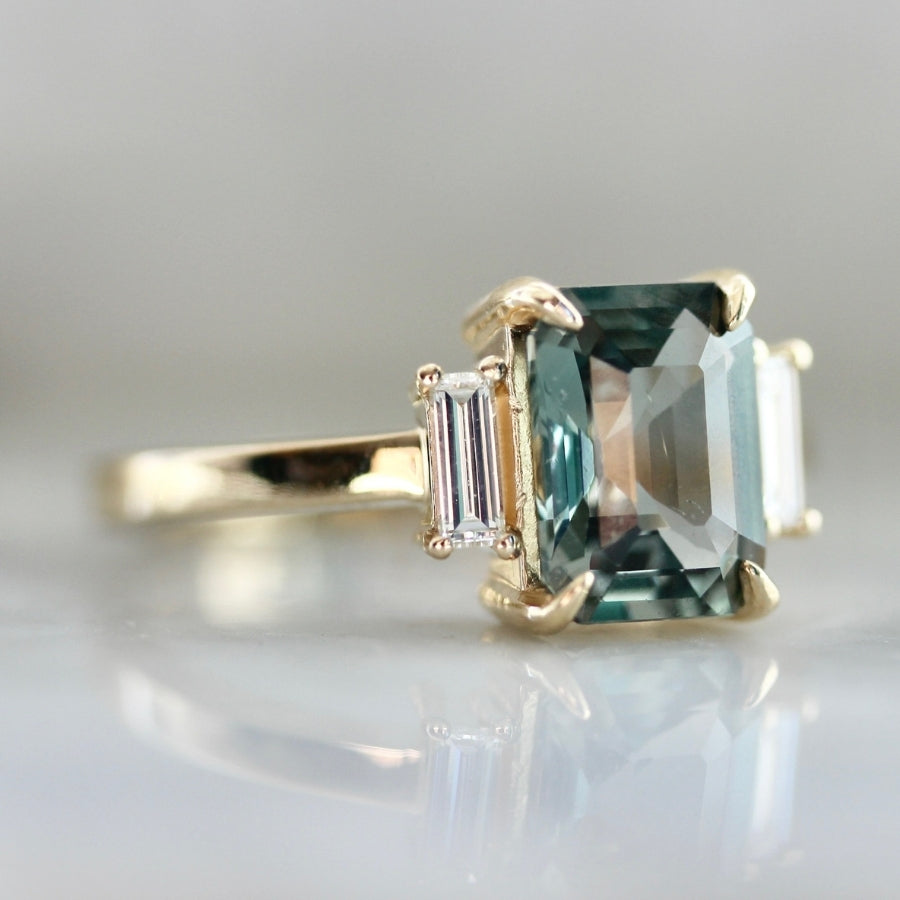 High Noon Green Color Change Emerald Cut Sapphire Ring