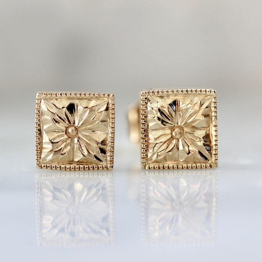 
            Daisy Dreams Engraved Gold Studs