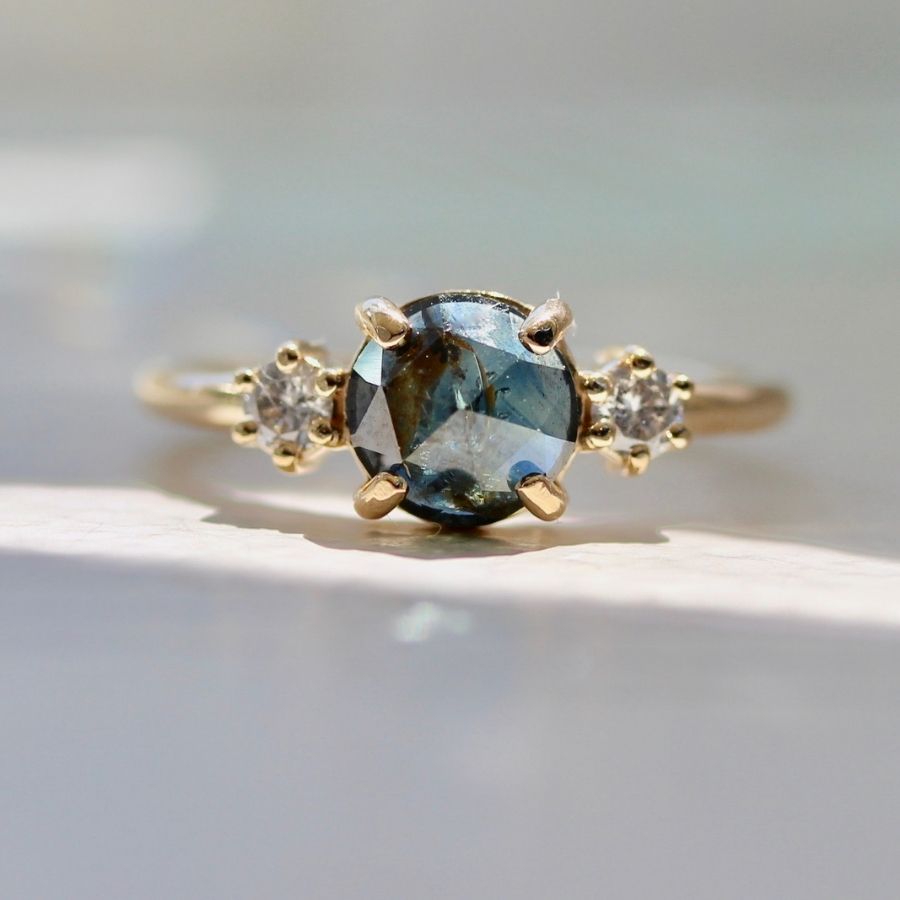 
            Nautilus Dark Blue Round Rose Cut Sapphire Ring