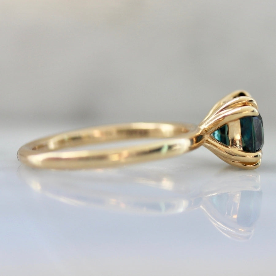 
            Coquette Teal Radiant Cut Sapphire Ring