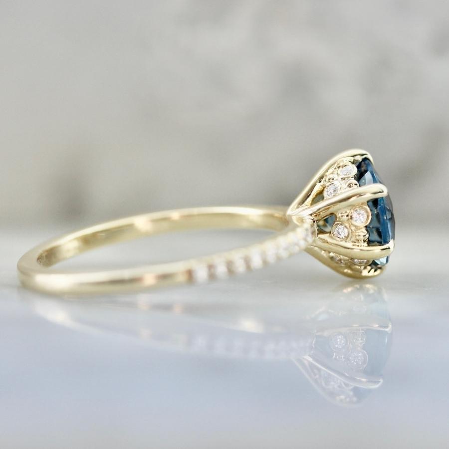 Iria Blue Round Brilliant Cut Sapphire Ring