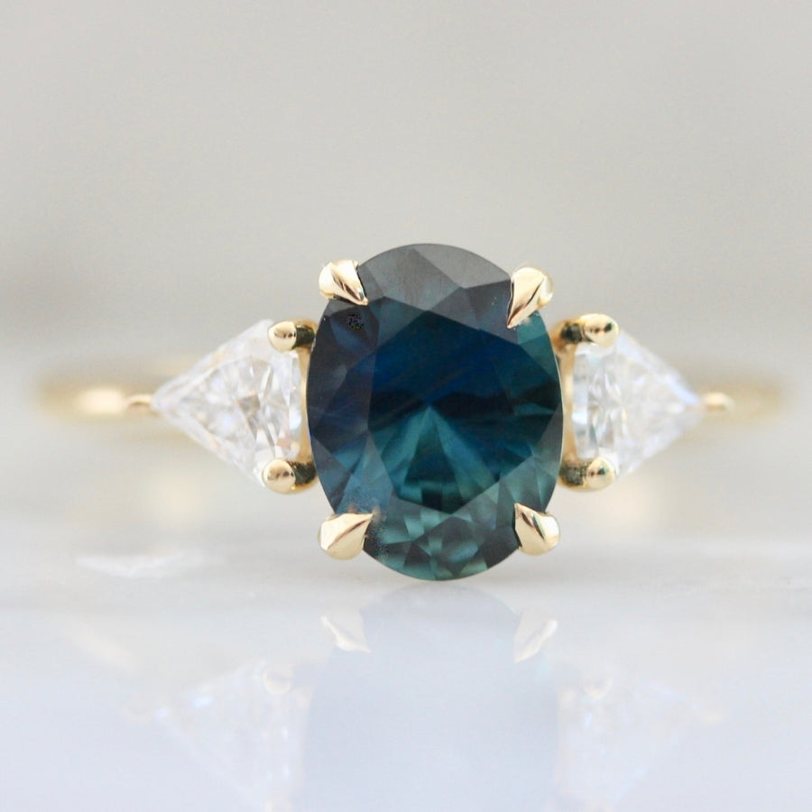 
            Lovebird Blue-Green Oval Cut Sapphire Ring