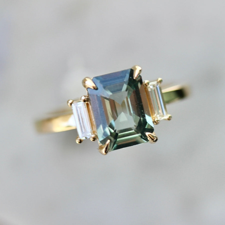 High Noon Green Color Change Emerald Cut Sapphire Ring