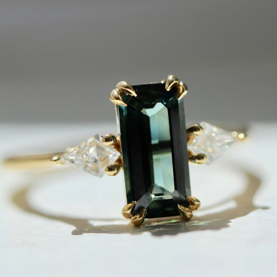 
            Starlet Green Emerald Cut Sapphire Ring