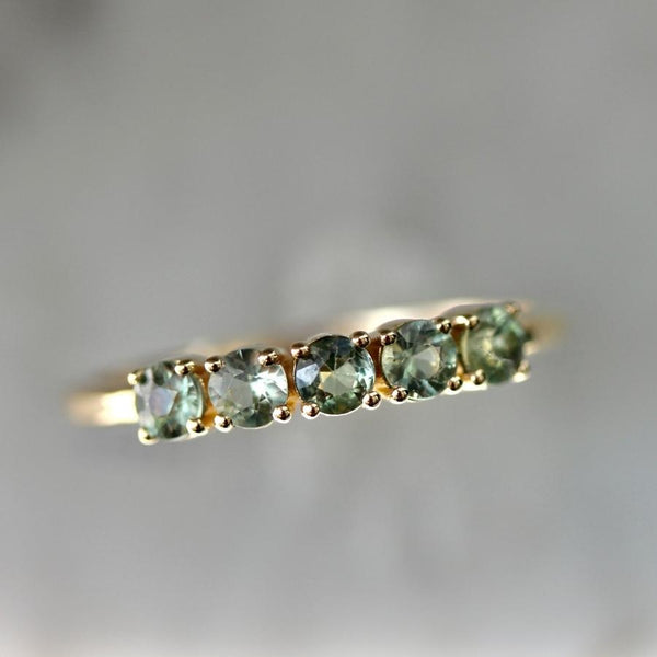 First Class Green Round Brilliant Cut Sapphire Band