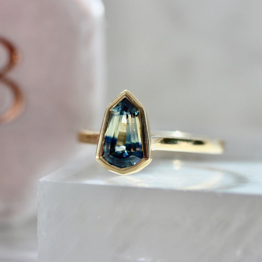 
            Tempest Bi-Color Blue-Yellow Shield Cut Sapphire Ring