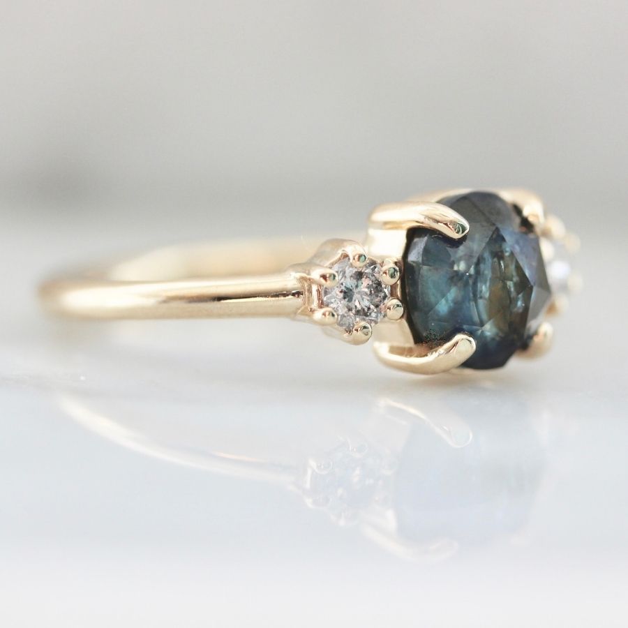 
            Nautilus Dark Blue Round Rose Cut Sapphire Ring