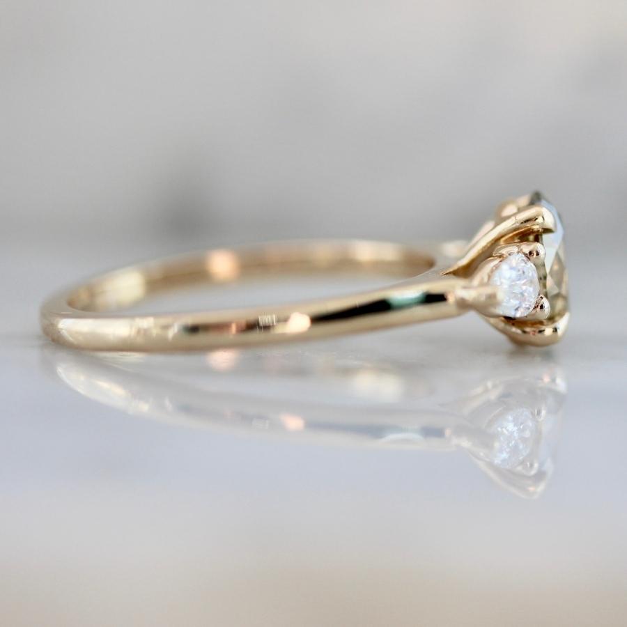 
            Persephone Green Oval Cut Diamond Ring