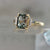 High Noon Green Color Change Emerald Cut Sapphire Ring
