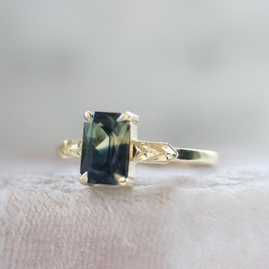 Big Dill Light Green-Blue Emerald Cut Parti Sapphire