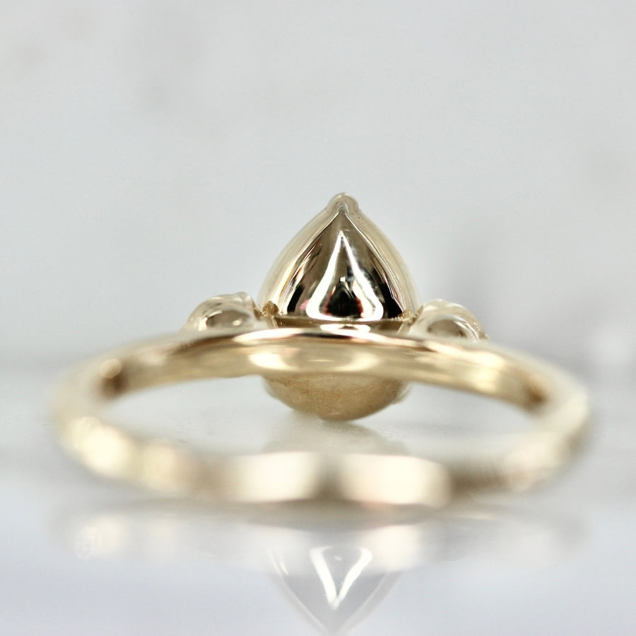 Blue Steel Pear Cut Sapphire Ring