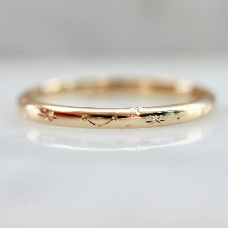 
            Equinox Moon and Constellation Engraved Gold Band