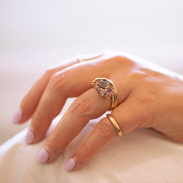 Heart in Hand Purple-Peach Oval Cut Sapphire Ring