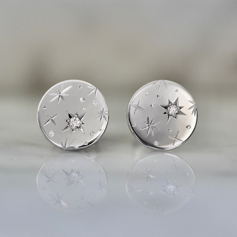 Star engraved round diamond earrings