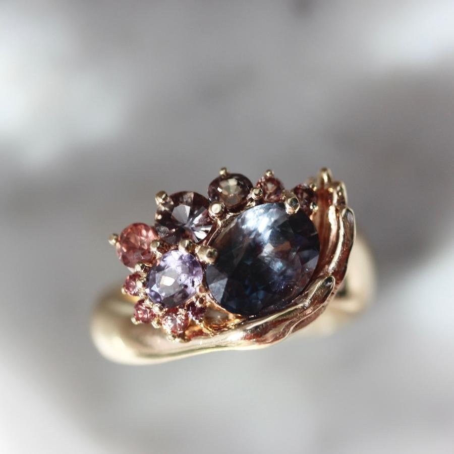Heart in Hand Purple-Peach Oval Cut Sapphire Ring