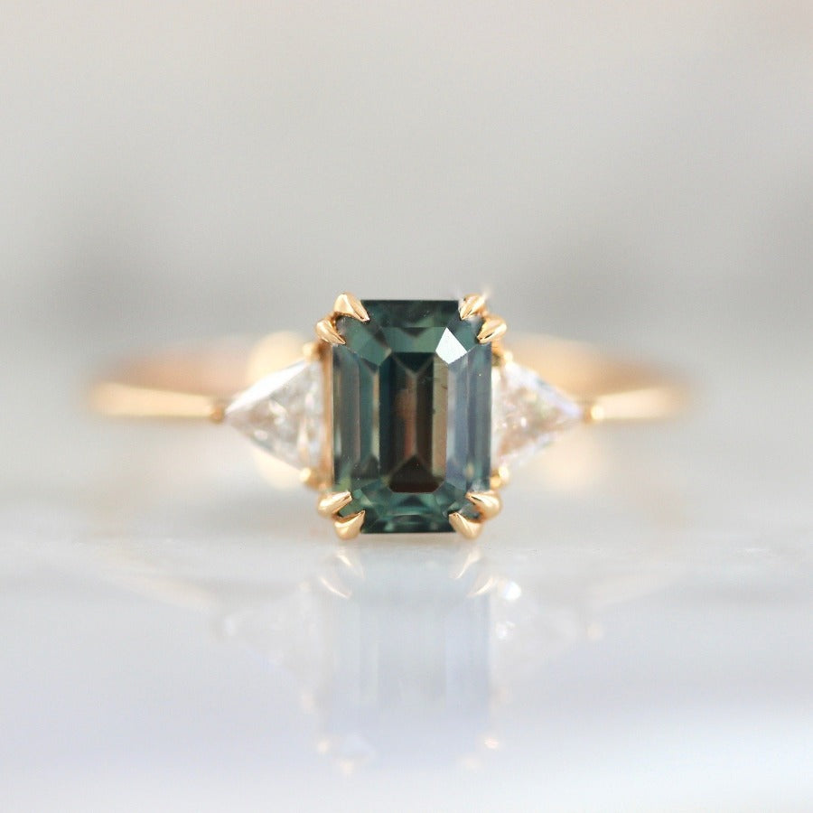 
            Pavlova Dark Teal Emerald Cut Sapphire &amp; Diamond Ring