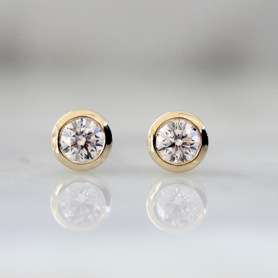 
            .21 Carats Total White Round Brilliant Cut Diamond Studs