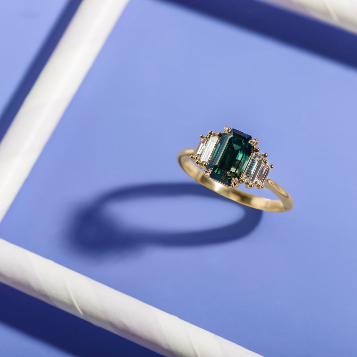 
            Garden Party Green-Teal Emerald Cut Sapphire Ring