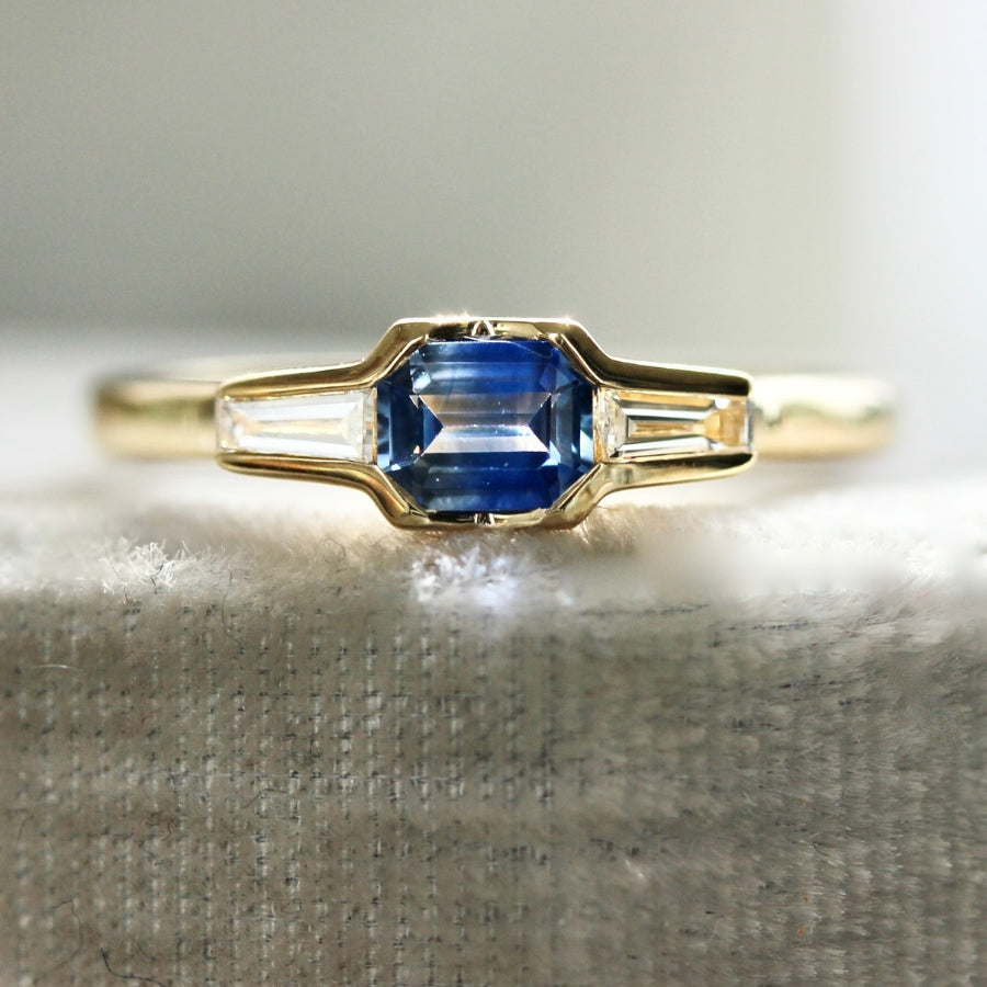 
            Lip Service Blue Bi-Color Emerald Cut Sapphire Ring