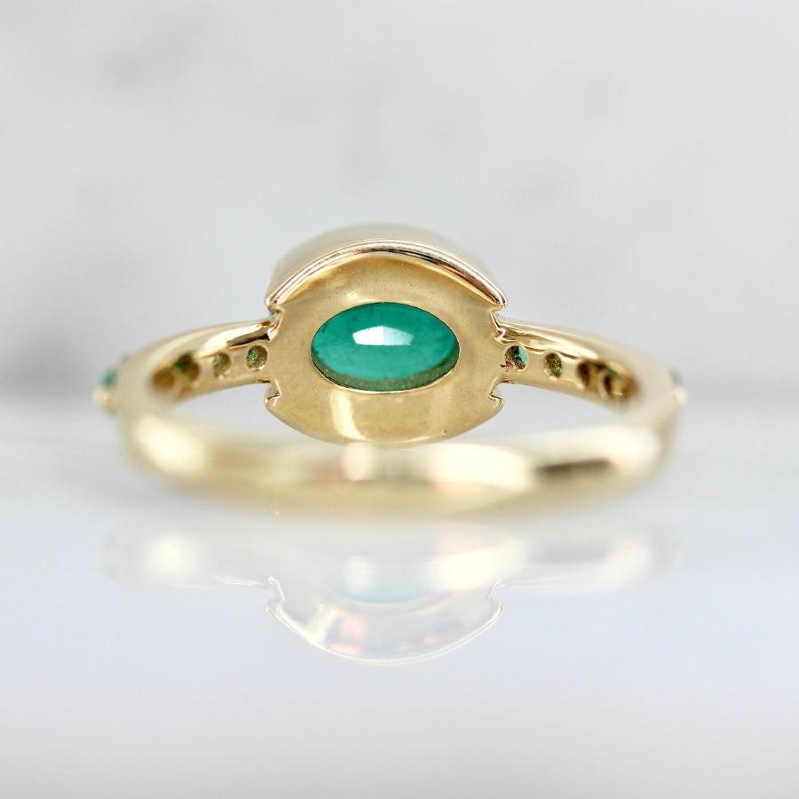 Mare Nubium Oval Cut Emerald Ring